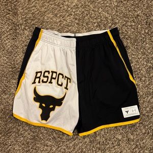 Men’s Project rock shorts. Colors are black yellow and white . 8inch seam